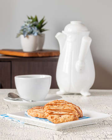 Fresh baked salted caramel shortbread cookies with coffee.