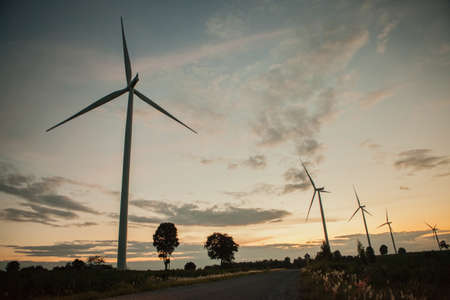 Wind turbine in sunsetの写真素材