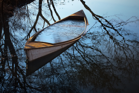 A boat submerged in waterの写真素材
