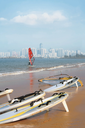 Water sport of the triangular sail on the west coast of Haikouの写真素材