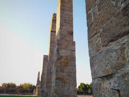 Beautiful ancient monument, a stone aqueduct that served to convey water with the background a blue...