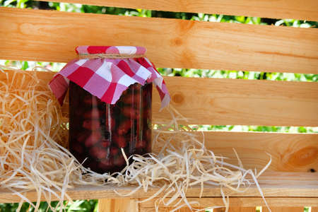 Homemade pickled kalamata olives in jar. Fermented healthy natural food conceptの写真素材