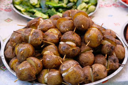Potatoes with lard on skewers. Ukrainian national food.の写真素材