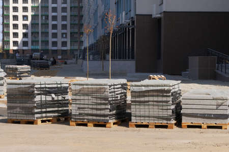 Construction Materials. Building materials for construction of residential complex. Pile of bricks...