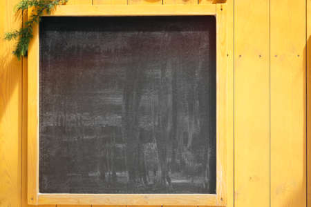 Empty space concept for advertising, mockup. Front view of a blank blackboard for text with...