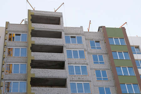 Building and Construction site of new home. House under construction. House under construction at...