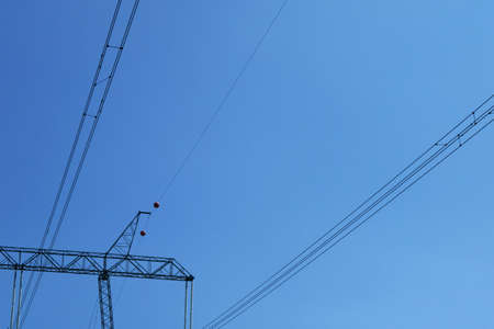 High voltage tower, sky background. Transmission line of electricity. Electric wire electric tower.