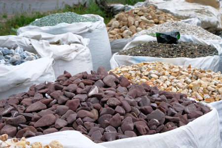 Variety of natural stones are sold in construction store. Construction Materials. Building materials for decoration and construction.の写真素材