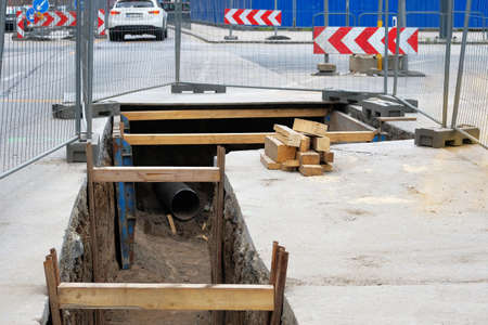 Engineering works. Repair of urban underground communications. Utility infrastructure. Deep hole for...
