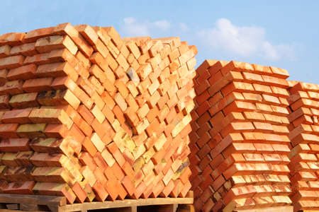 Construction Materials. Building materials for construction of residential complex. Pile of...