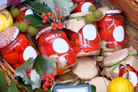 Fermented food concept. Jars with homemade pickled or fermented  colorful vegetables in farmer agricultural market. Farm product in local market. Rural style.の写真素材