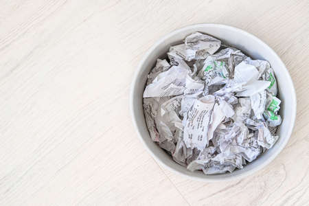Used sales receipts prepared for recycling. Recyclable materials. Waste to be recycled. Free space.の写真素材