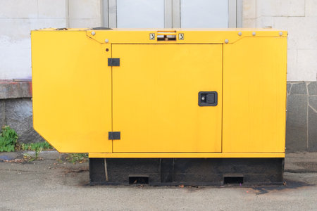 Industrial generator. Backup power supply of generator. Autonomous emergency power supply. Auxiliary diesel generator for emergency power supply.の写真素材