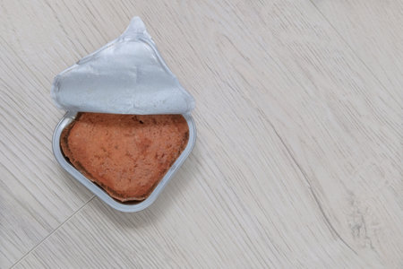 Food for animal. Pate for cats and dogs in metal container. Conserved nutrition. Place for text. Top view.の写真素材