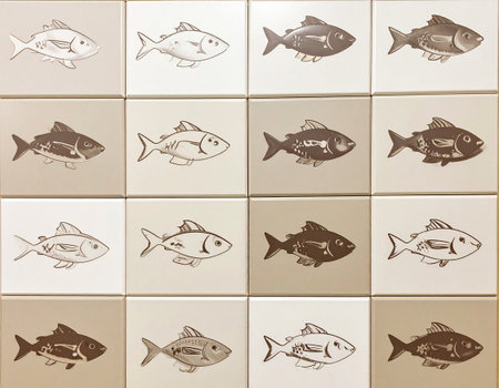 Texture of ceramic tile with a of pattern of fish in beige tones. Material for interior. Design mockup and background. Wall.の素材