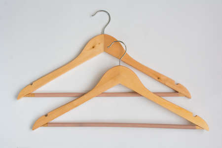 Two Over Lapping Wooden Coat Hangersの写真素材