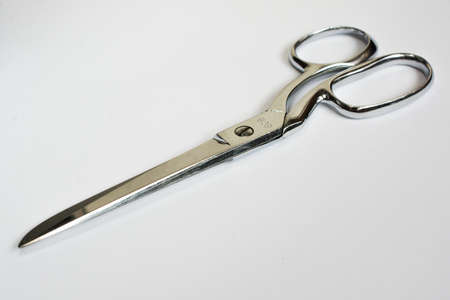 Metal Sewing Scissors Closed Isolated on White Isolated on White in Perspectiveの写真素材