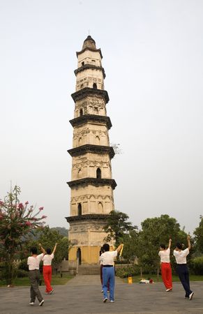 Exercising in front of Great Mercy Pagoda Shaoxing, Zhejiang Province, Chinaの写真素材