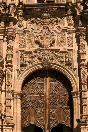 Ornate Wooden Door Valencia Church, Templo de San Cayetano, Guanajuato, Mexicoの写真素材
