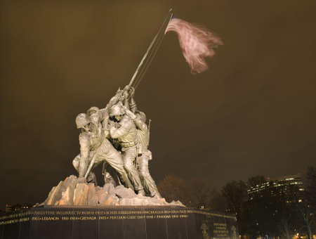 The Marine Corps War Memorial Shows the Raising of the Flag at Iwo Jima in World War II  Washington DC  Rosslyn Buildings in Background Statue finished in 1954のeditorial素材
