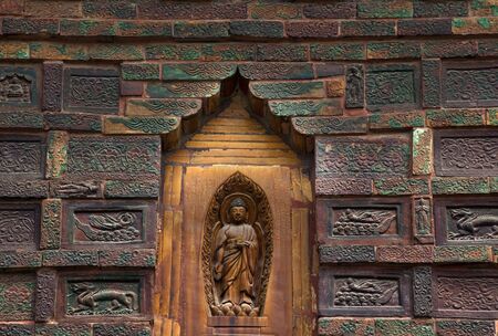 Ancient Buddha Bricks Dancers Angels Flute Player Details Iron Pagoda Buddhist Monument Kaifeng China Built in 1069 by the Kaibao Buddhist Monastery.  Best example of glazed brick pagoda in Chinaの写真素材