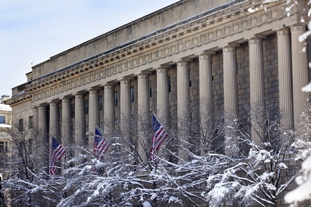 Commerce Department After the Snow Flags Pennsylvania Avenue Washington DCの写真素材