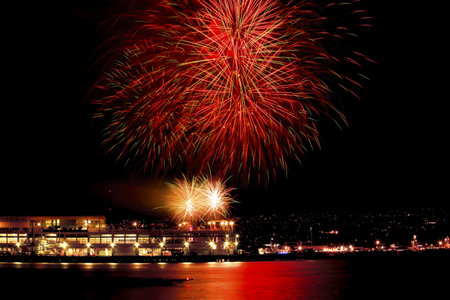 Red Green Fireworks Vancouver Harbor Canada Day British Columbia Pacific Northwestのeditorial素材