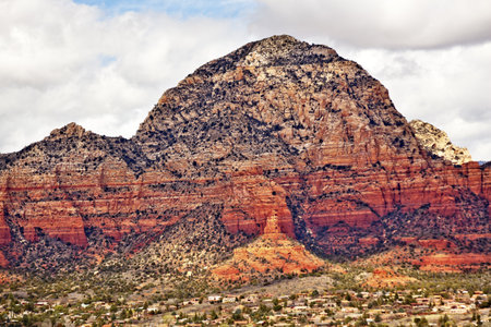 Capitol Butte Orange Red Rock Canyon Houses, Blue Cloudy Sky Green Trees Snow West Sedona Arizonaのeditorial素材