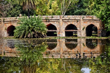  Athpula Eight Piers Stone Bridge Reflection Lodi Gardens New Delhi India 17th Century Bridgeの写真素材