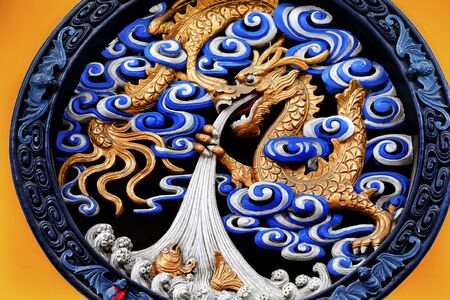 Dragon Metal Sculputure Outside Jade Buddha Temple Jufo Si Shanghai China Most famous buddhist temple in Shanghaiの写真素材