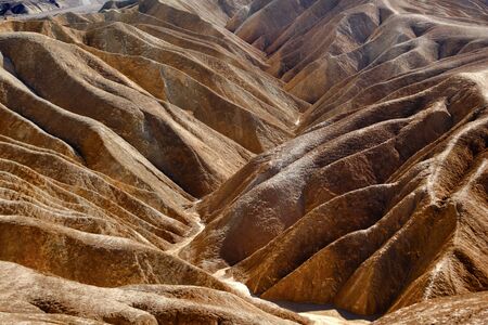 Zabriski Point Road Mudstones form Badlands  Death Valley National Park Californiaの写真素材
