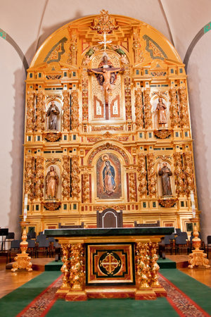 Golden Altar at Mission Basilica San Juan Capistrano Church California.  This is the successor...