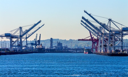 Seattle Washington Port with Red White Cranes Containers and Freighters Ships at Pier to Be Unloaded...