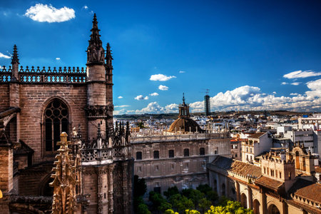 Cityscape, City View, from Giralda Spire, Bell Tower, Seville Cathedral, Andalusia Spain   Built in the 1500s   Largest Gothic Cathedral in the World and Third Largest Church in the World   Burial Place of Christopher Columbus   の写真素材