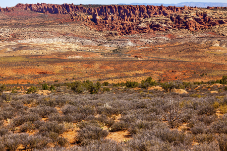 Painted Desert Colorful Yellow Grass Lands Orange Sandstone Red Fiery Furnace Arches National Park Moab Utah USA Southwest  の写真素材