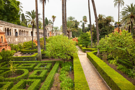 Walls Garden Alcazar Royal Palace Seville Andalusia Spain   Originally a Moorish Fort, oldest Royal Palace still in use in Europe  Built in the 1100s and rebuilt in the 1300s  のeditorial素材