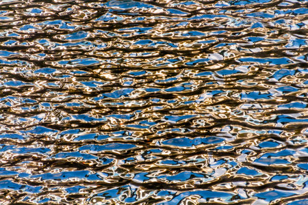 911 Memorial Pool Waterfall Reflections Pattenrs Abstract New York NY.  Pool is in the foundation of one of the Two World Trade Center Buildings.  Water falls into hole of the foundation.  のeditorial素材