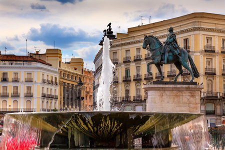 Puerta del Sol Gate of the Sun Most Famous Square Fountain King Carlos III Equestrian Statue in Madrid Spain King of Spain in the 1700s.  Replica of statue created in 1700s by Juan Pascal de de Menaのeditorial素材
