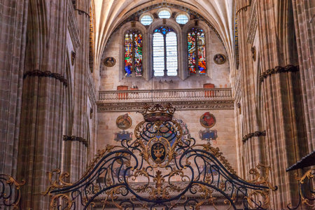 Stone Columns Crest Stained Glass Salamanca New Cathedral Castile Spain. The New and Old Cathedrals in Salamanca are right next to each other.  New Cathedral was built from 1513 to 1733 and commissioned by Ferdinand V of Castile, Spain.のeditorial素材