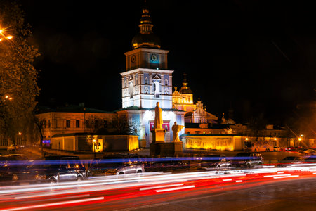 Saint Michael Monastery Cathedral Steeples Spires Tower Night Traffic Lights Facade Kiev Ukraine.  Saint Michael's is a functioning Greek Orthordox Monasatery in Kiev.  The original monastery was created in the 1100s but was destroyed by the Soviet Union のeditorial素材