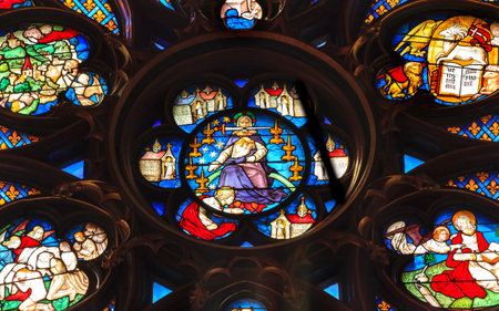 Jesus Christ With Sword Rose Window Stained Glass Saint Chapelle Paris France.  Saint King Louis 9th created Sainte Chappel in 1248 to house Christian relics, including Christ's Crown of Thorns.  Stained Glass created in the 13th Century and shows variousのeditorial素材