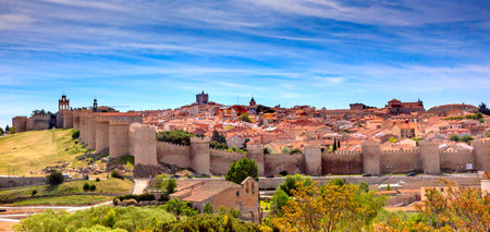 Avila Ancient Medieval City Walls Castle Swallows Castile Spain.  Avila is described as the most...
