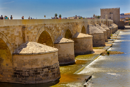 Ancient Roman Bridge Entrance River Guadalquivir Cordoba Spain  Roman bridge was built in the 1st Century BC.の写真素材