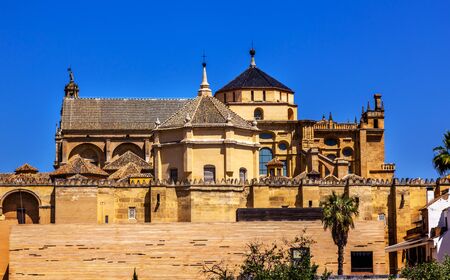 Mezquita Catholic Cathedral Puerta del Puente Cordoba Spain. Created in 785 as a Mosque, was converted to a Cathedral in the 1500.の写真素材