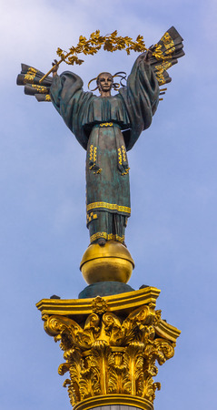 Peasant Girl Slavic Goddess Berehynia on top Independence Monument, Symbol of Ukraine Independence and Orange Revolution, Maidan Square Kiev Ukraineの写真素材