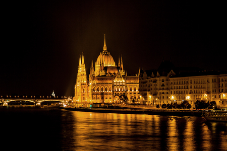 Parliament Building Boats Danube River Reflection Budapest Hungary.  Parliament Building built betwwn 1885 to 1904.の写真素材