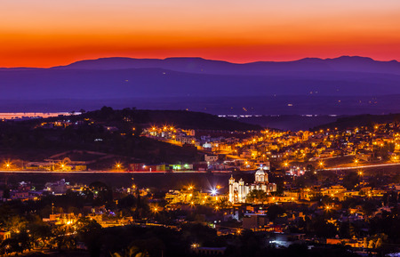 San Miguel de Allende, Mexico, Miramar Overlook Sunset Mountaints White Church  Housesの写真素材
