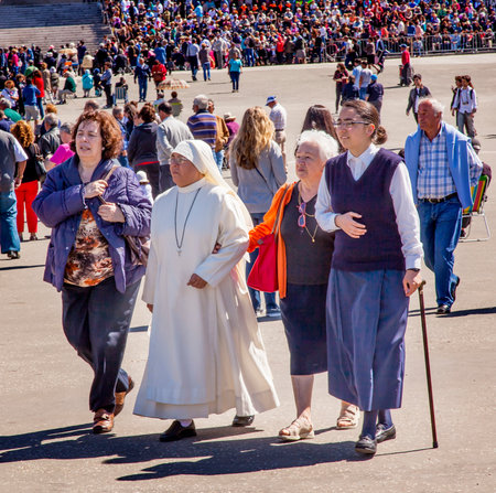 Nuns Believers Pilgrims May 13th Celebration Basilica of Lady of Rosary Bell Tower Fatima Portugal....