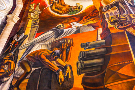 Spanish Royalty Cannons Priest Indians Morado Mural Independence Monument Window Alhondiga de Granaditas Guanajuato Mexico.  Battle Site 1810 Mexican War of Independence and window where Miguel Hidalgo's head exhibited.  Mural by Jose Chavez Morado in 196のeditorial素材