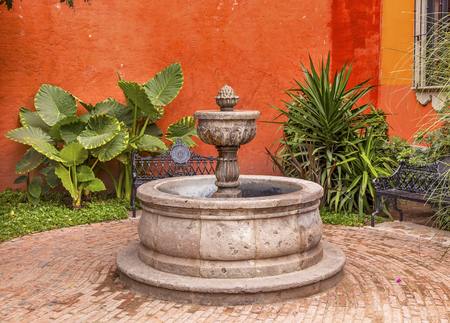 Orange Yellow Fountain Plaza Juarez Park San Miguel de Allende Mexico. の写真素材